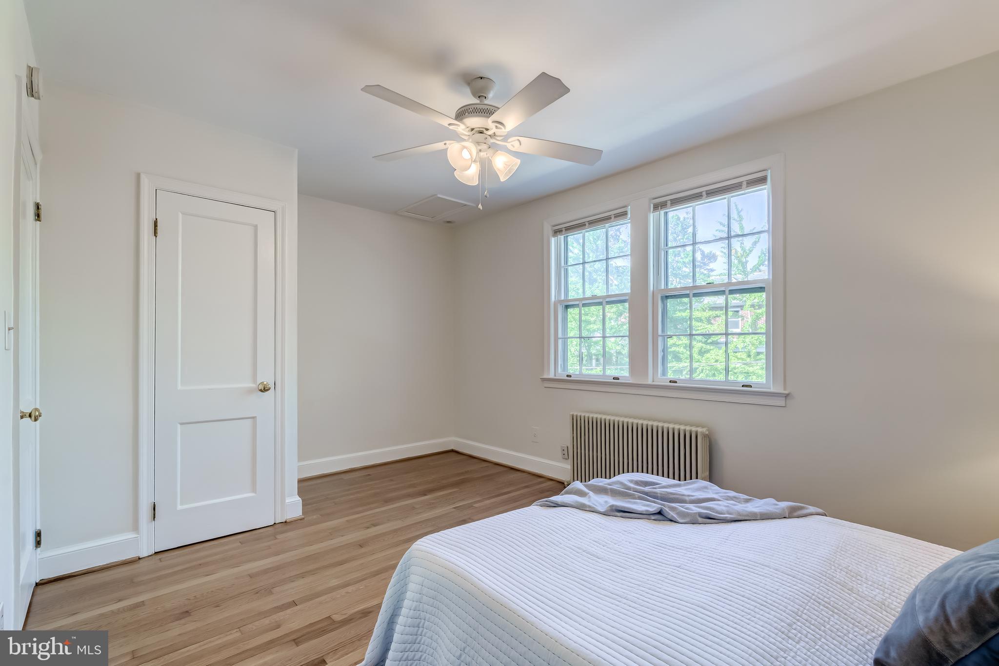 2217 39th Place Northwest Washington, DC 20007 - Photo 11 of 28 a bedroom with a large bed and a window