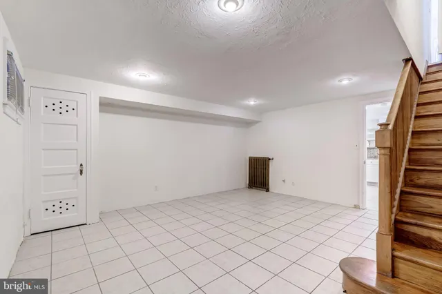 a bathroom with a sink toilet and mirror