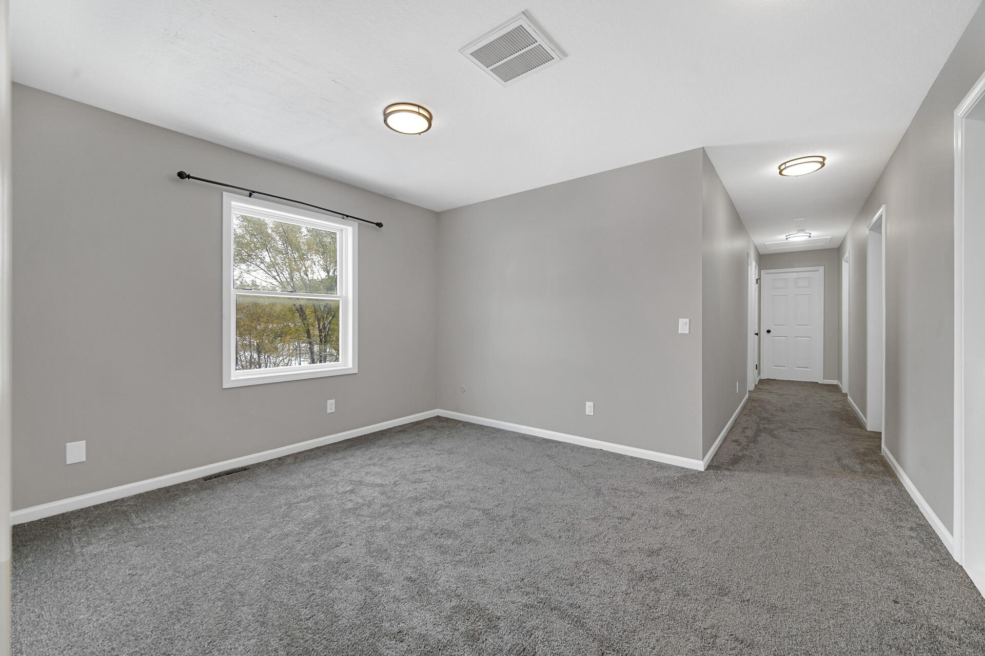 3028 West 15th Avenue Gary, IN 46404 - Photo 15 of 30 a view of an empty room with windows and closet