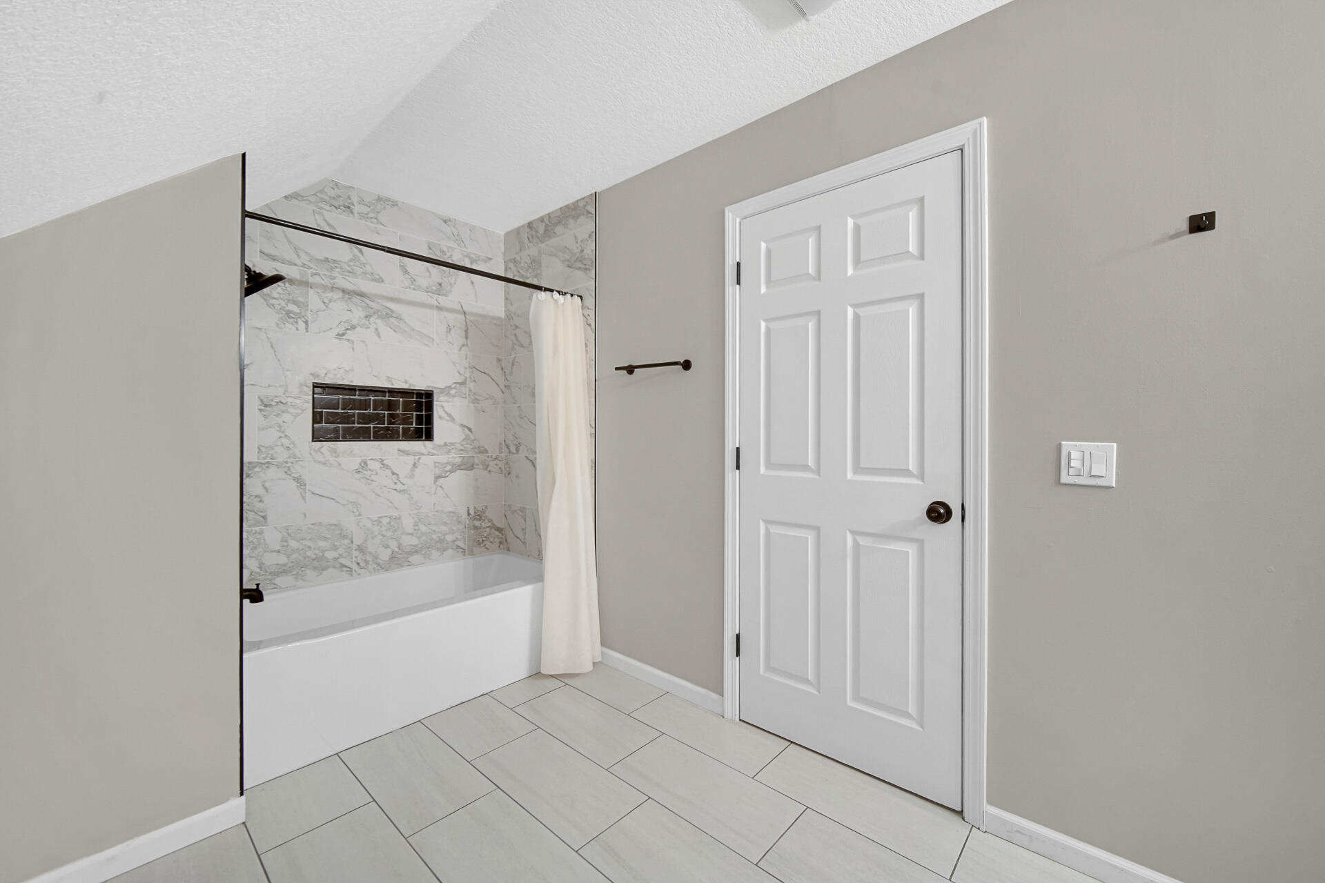 3028 West 15th Avenue Gary, IN 46404 - Photo 18 of 30 a view of a bathroom with a bathtub and shower