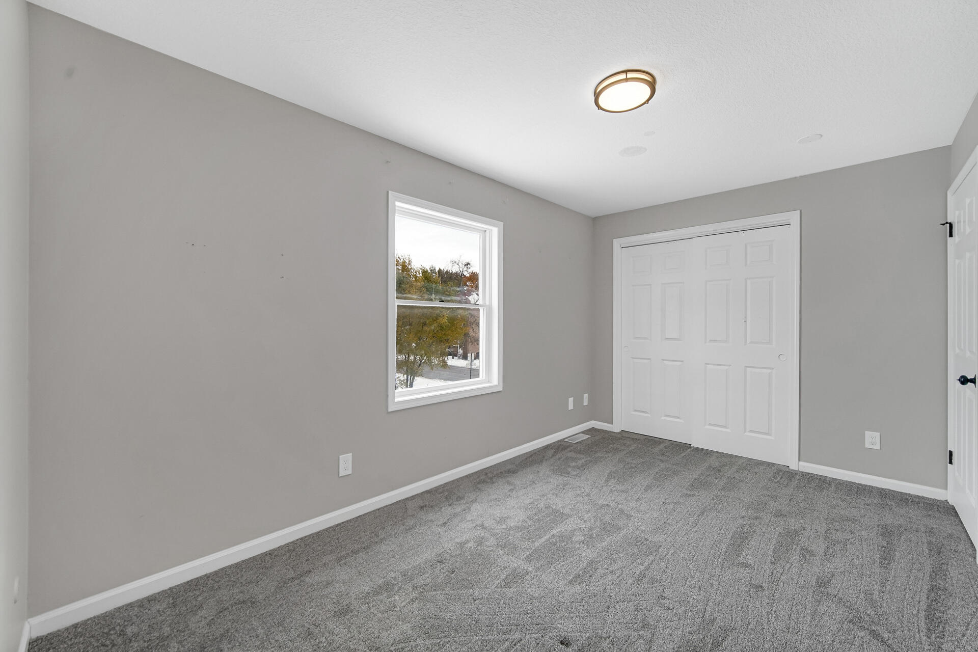 3028 West 15th Avenue Gary, IN 46404 - Photo 21 of 30 a view of an empty room with a window