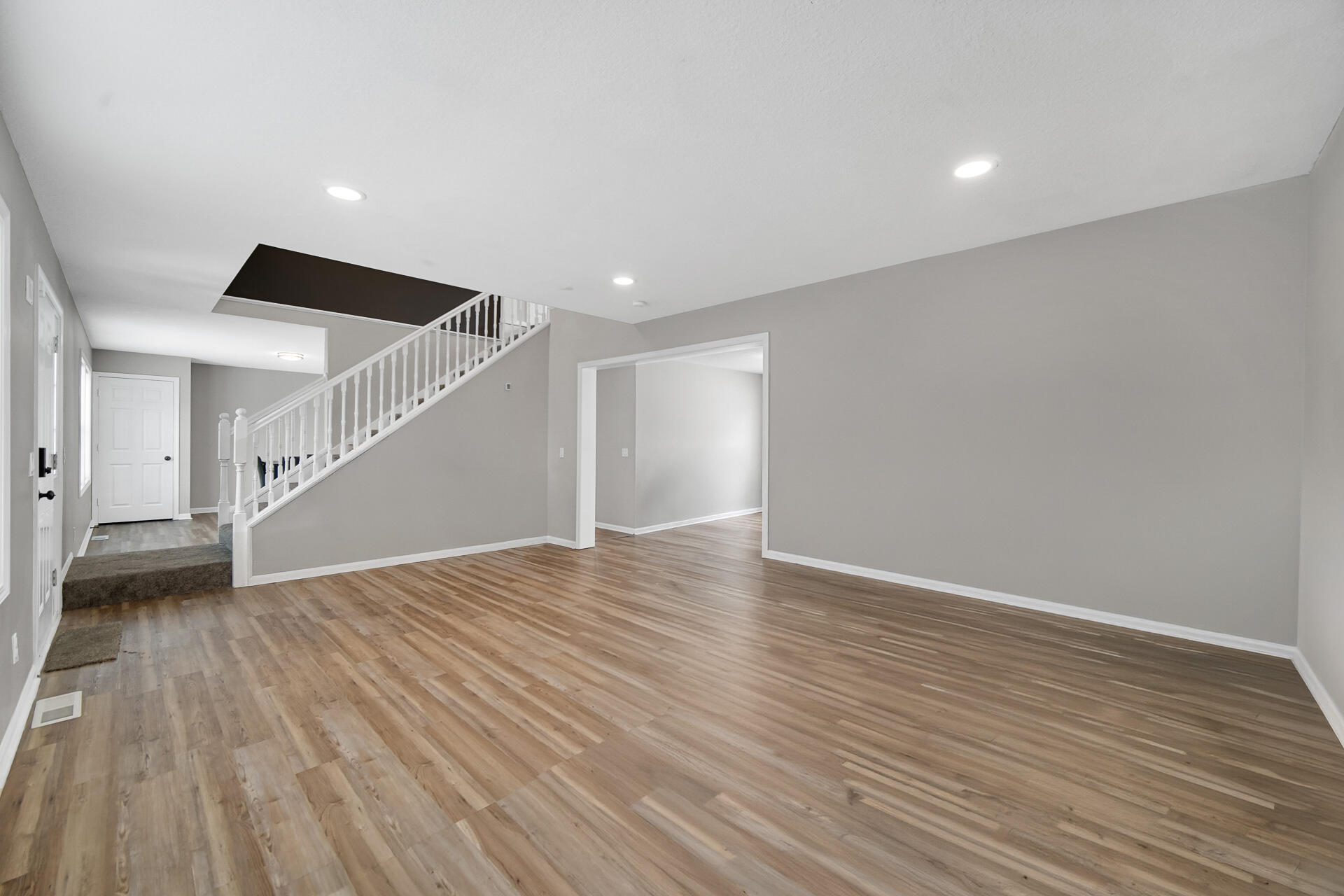 3028 West 15th Avenue Gary, IN 46404 - Photo 3 of 30 a view of empty room with wooden floor