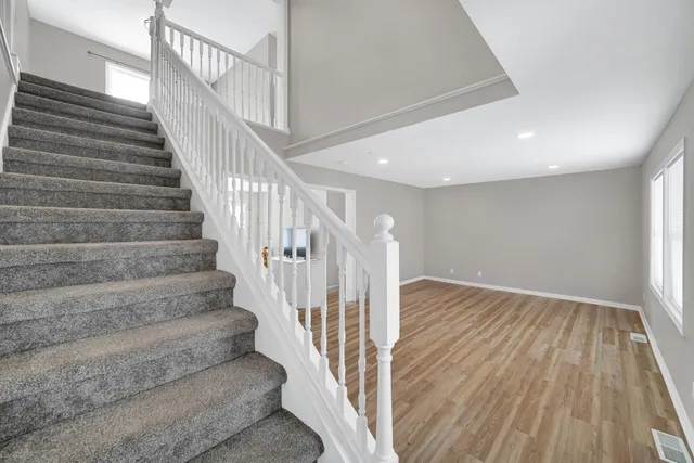 a view of entryway with wooden floor