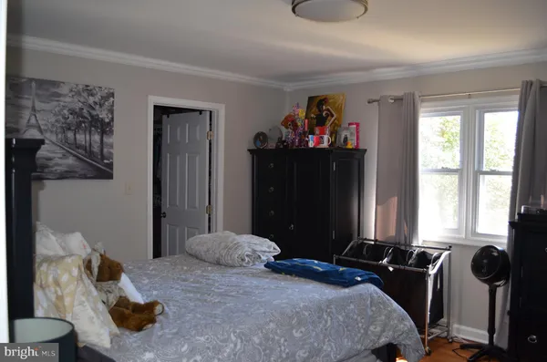 a room with furniture and a window