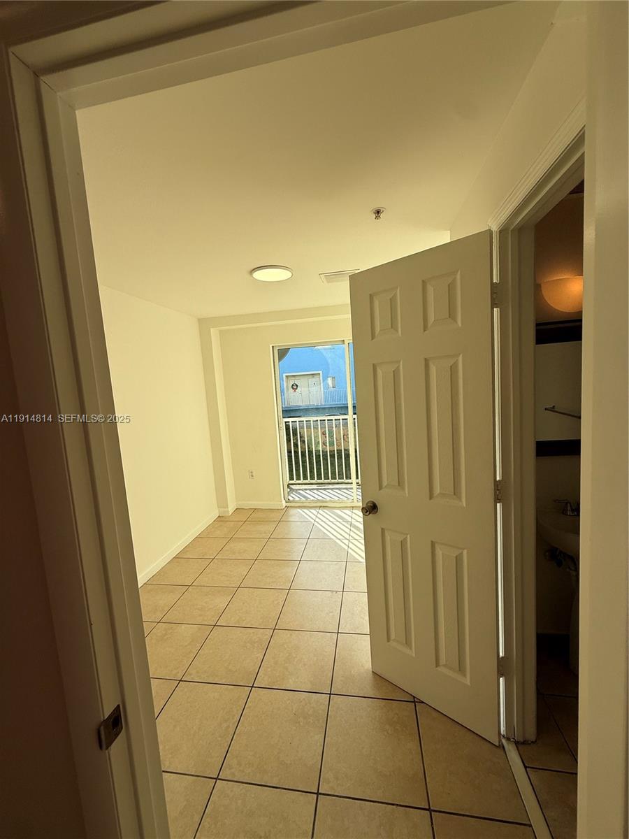821 Southwest 2nd Street, Unit 7 Miami, FL 33130 - Photo 20 of 29 a view of a hallway
