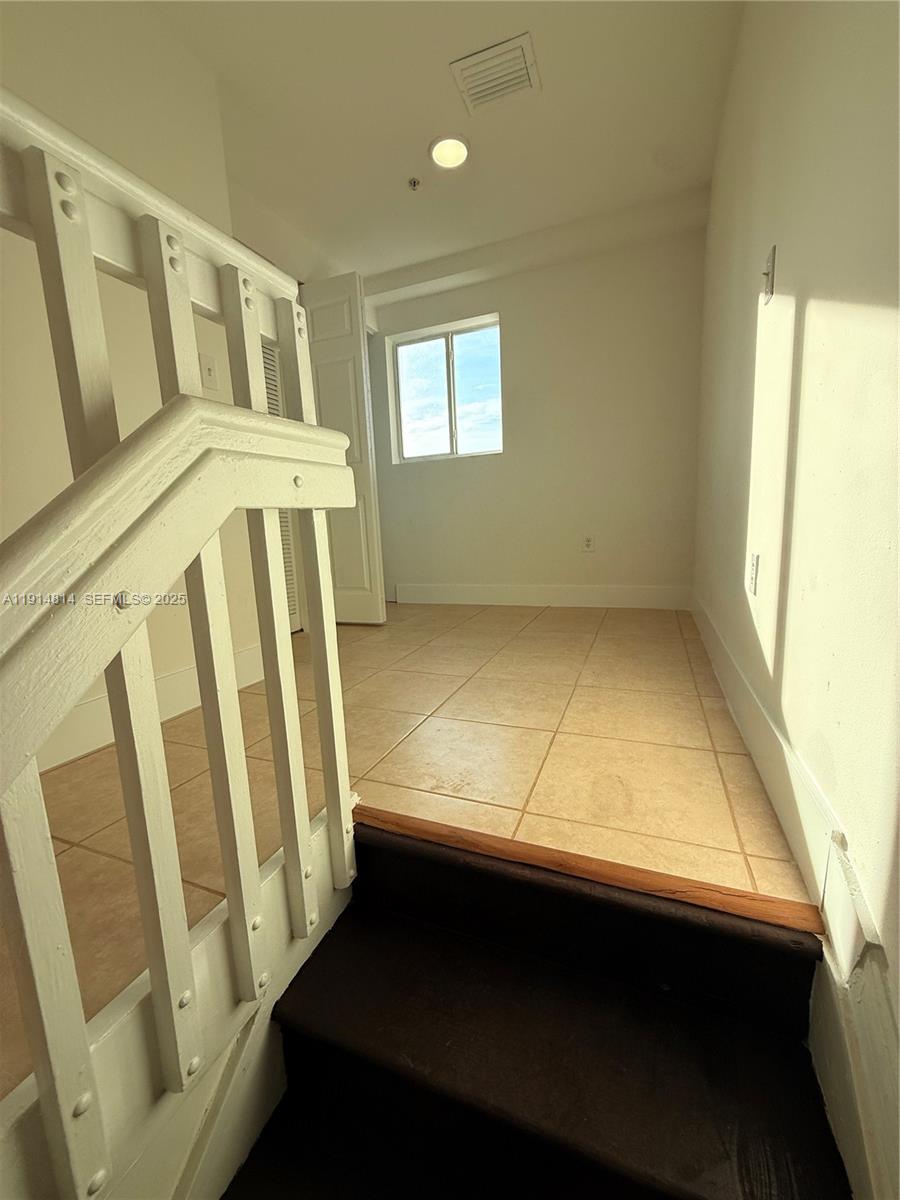 821 Southwest 2nd Street, Unit 7 Miami, FL 33130 - Photo 28 of 29 a view of walk in closet with window