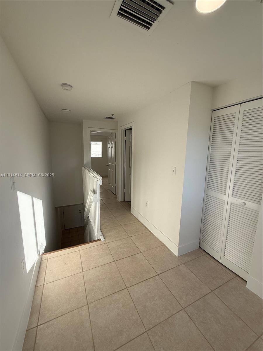 821 Southwest 2nd Street, Unit 7 Miami, FL 33130 - Photo 7 of 29 a bathroom with a sink and a toilet