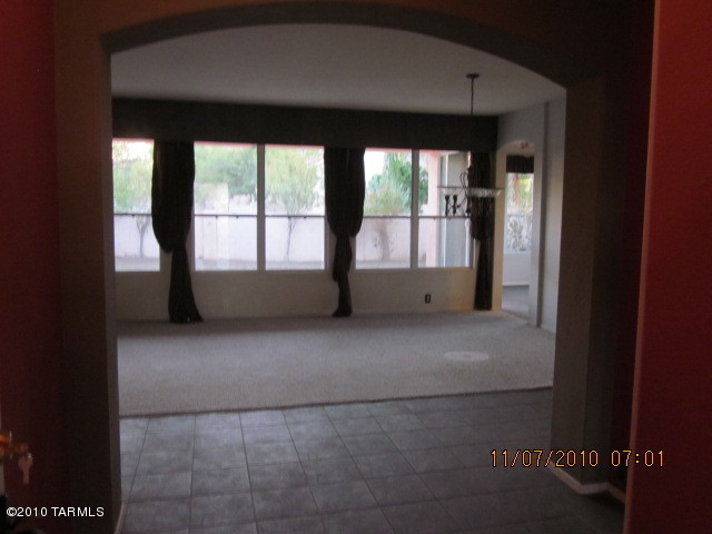 9920 North Stratton Saddle Trail Tucson, AZ 85742 - Photo 2 of 10 a view of an empty room with a large window