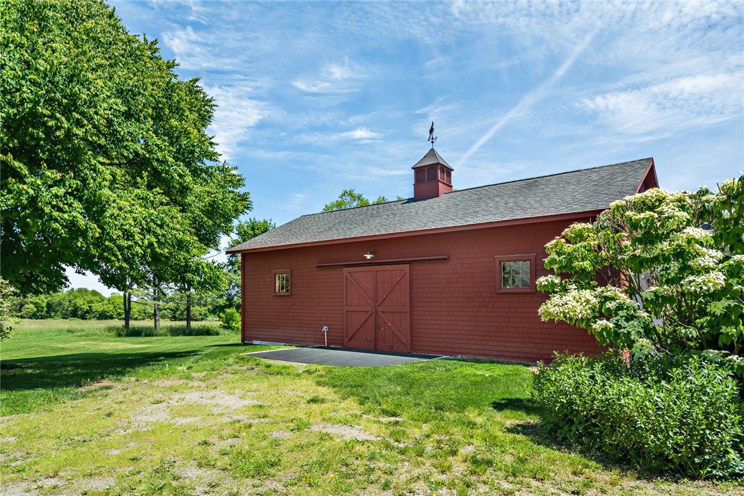 1510 Boston Neck Road North Kingstown, RI 02874 - Photo 35 of 40 Picture perfect attached 3 stall barn with cupola