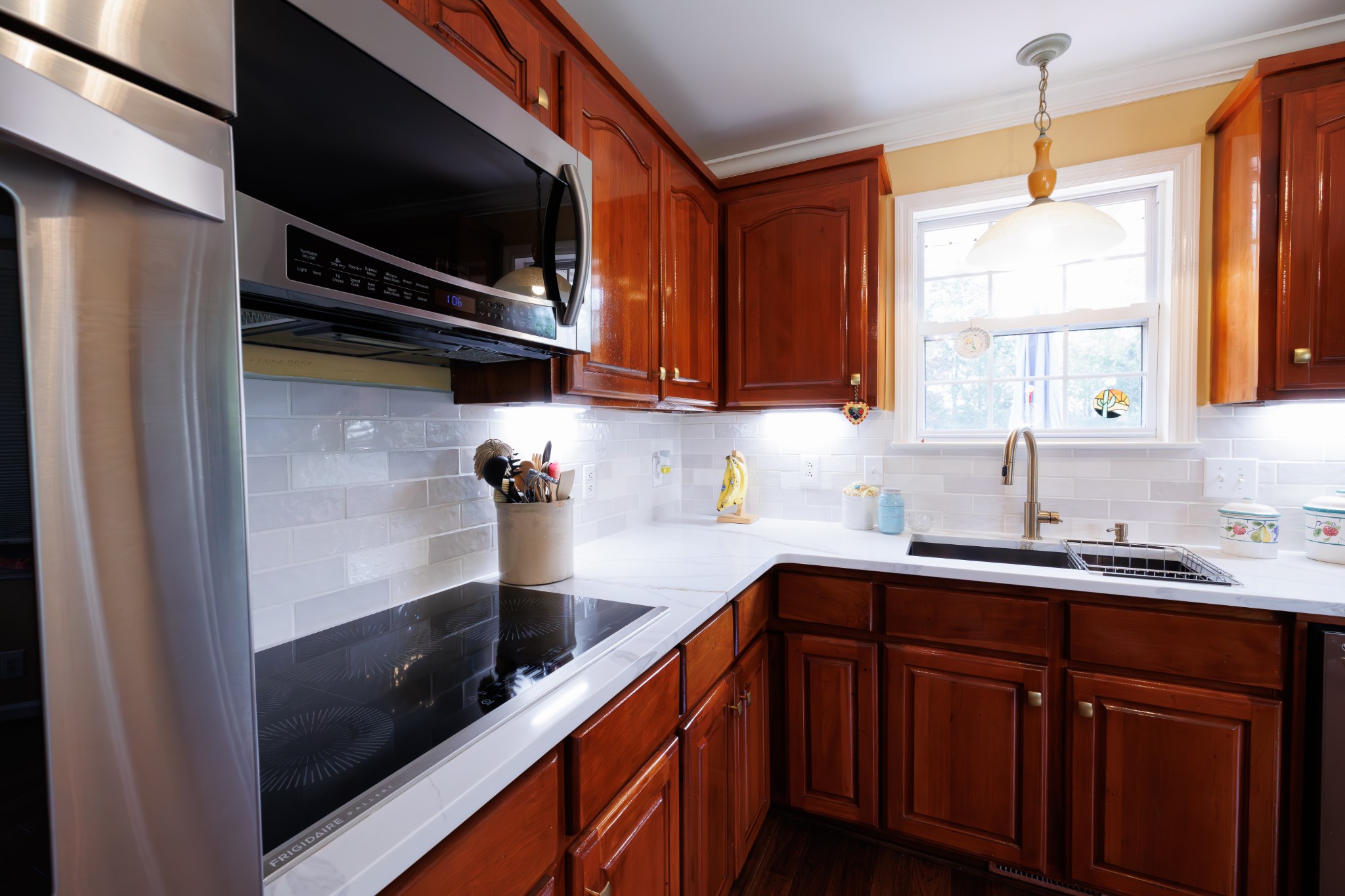 4215 Pate Road Franklin, TN 37064 - Photo 12 of 34 a kitchen with a sink microwave and window