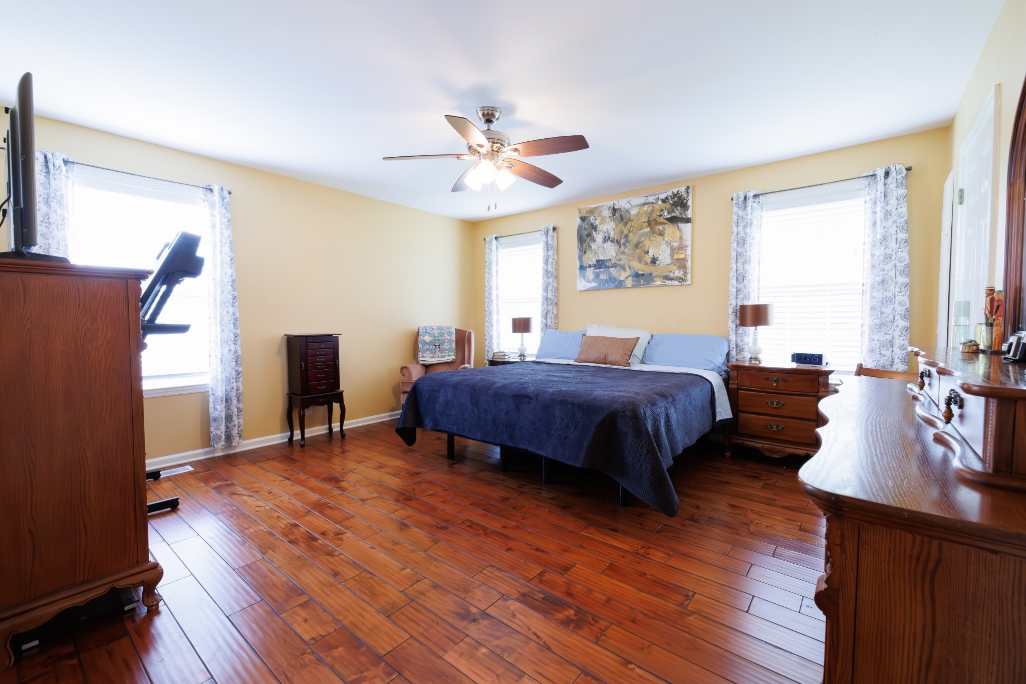 4215 Pate Road Franklin, TN 37064 - Photo 18 of 34 a bedroom with a bed wooden floor and window