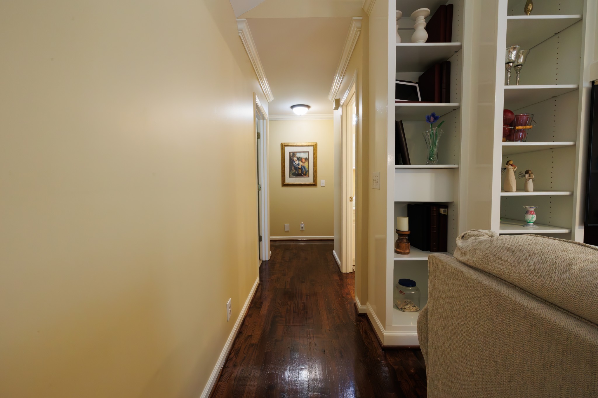 4215 Pate Road Franklin, TN 37064 - Photo 20 of 34 a view of a hallway with wooden floor and a fireplace