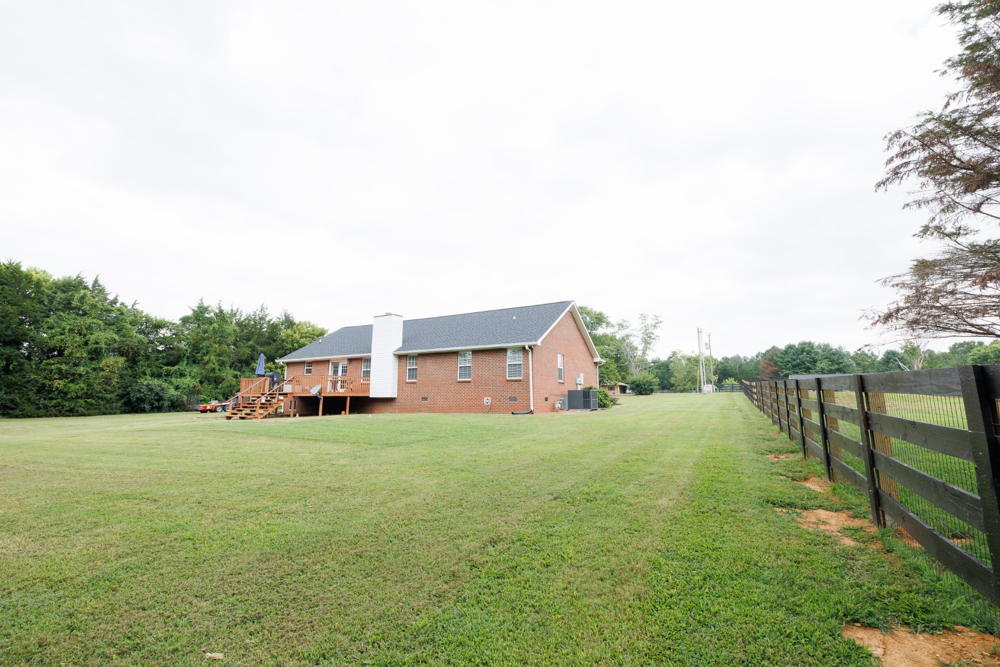 4215 Pate Road Franklin, TN 37064 - Photo 30 of 34 a view of a house with a yard and sitting area