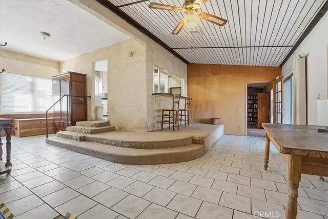a lobby with furniture and window
