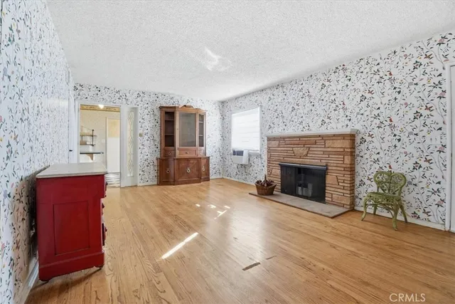 a view of a livingroom with a fireplace