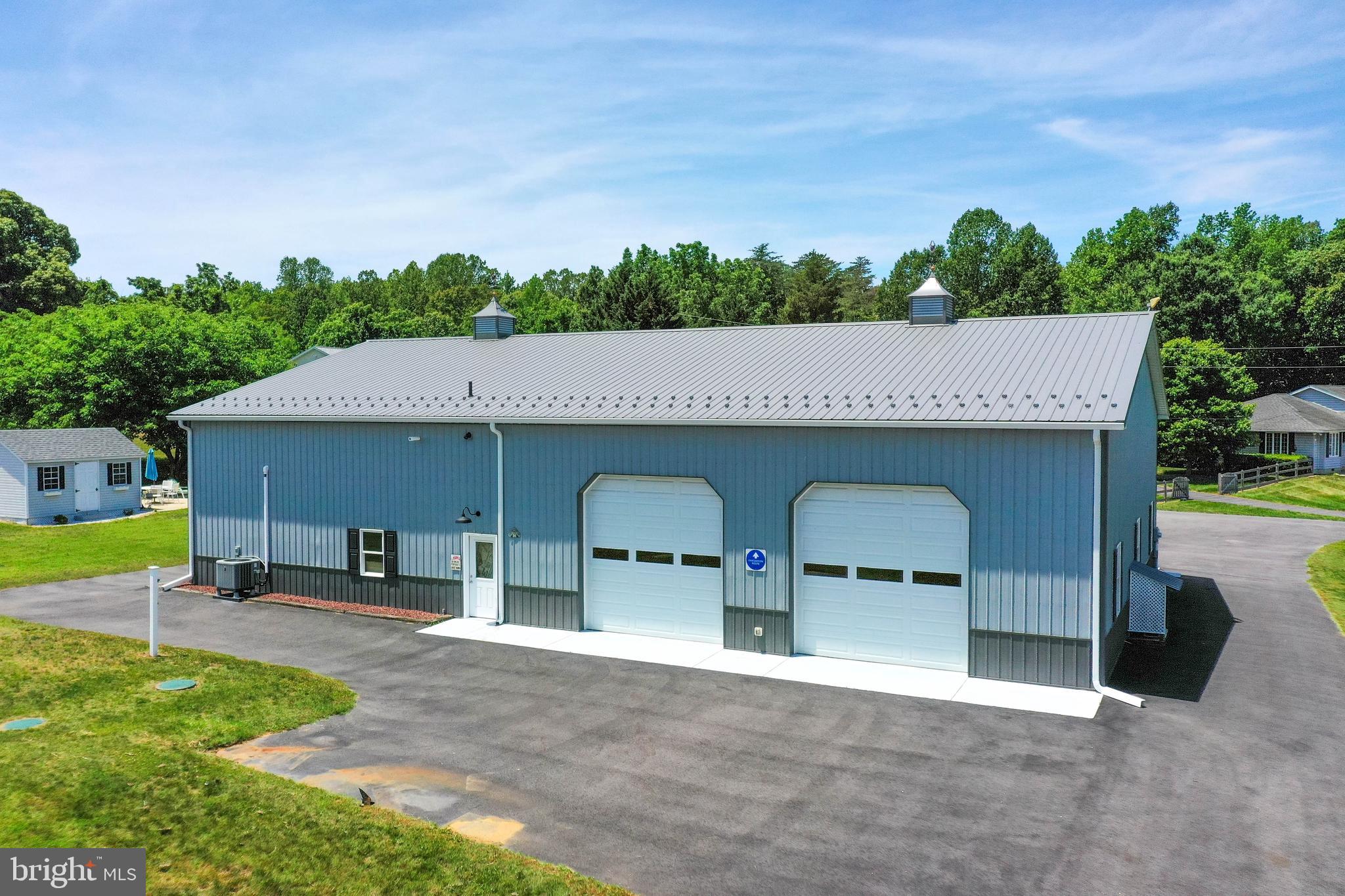 56 Barstow Road Prince Frederick, MD 20678 - Photo 9 of 14 Garage Has Four 12 X 12 Foot Garage Doors...