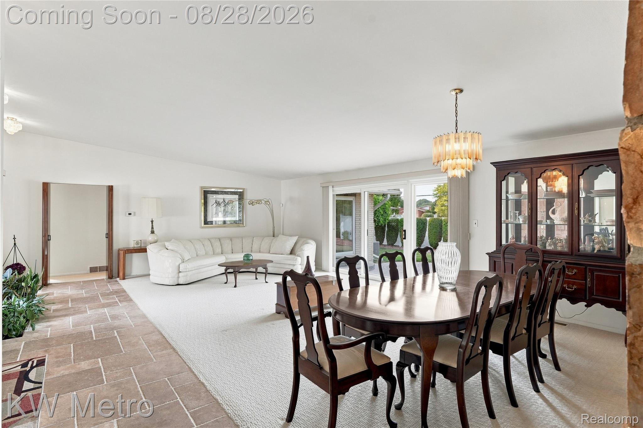 17700 Adrian Road Southfield, MI 48075 - Photo 6 of 24 Expansive living area with recessed lighting, tile flooring, and a sliding glass door