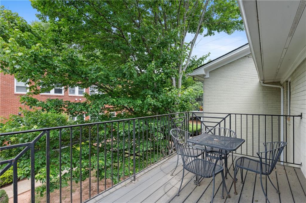 866 Briarcliff Road Northeast, Unit B3 Atlanta, GA 30306 - Photo 15 of 17 a view of balcony with furniture and wooden deck