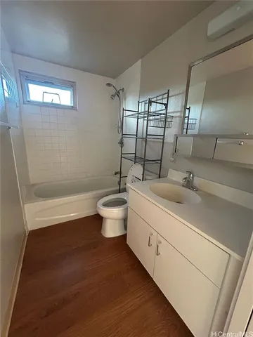 a bathroom with a sink and a large mirror