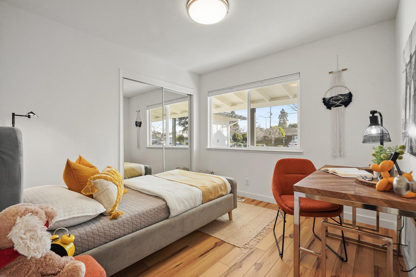 545 Sobrato Drive Campbell, CA 95008 - Photo 11 of 32 a bedroom with a bed and wooden floor