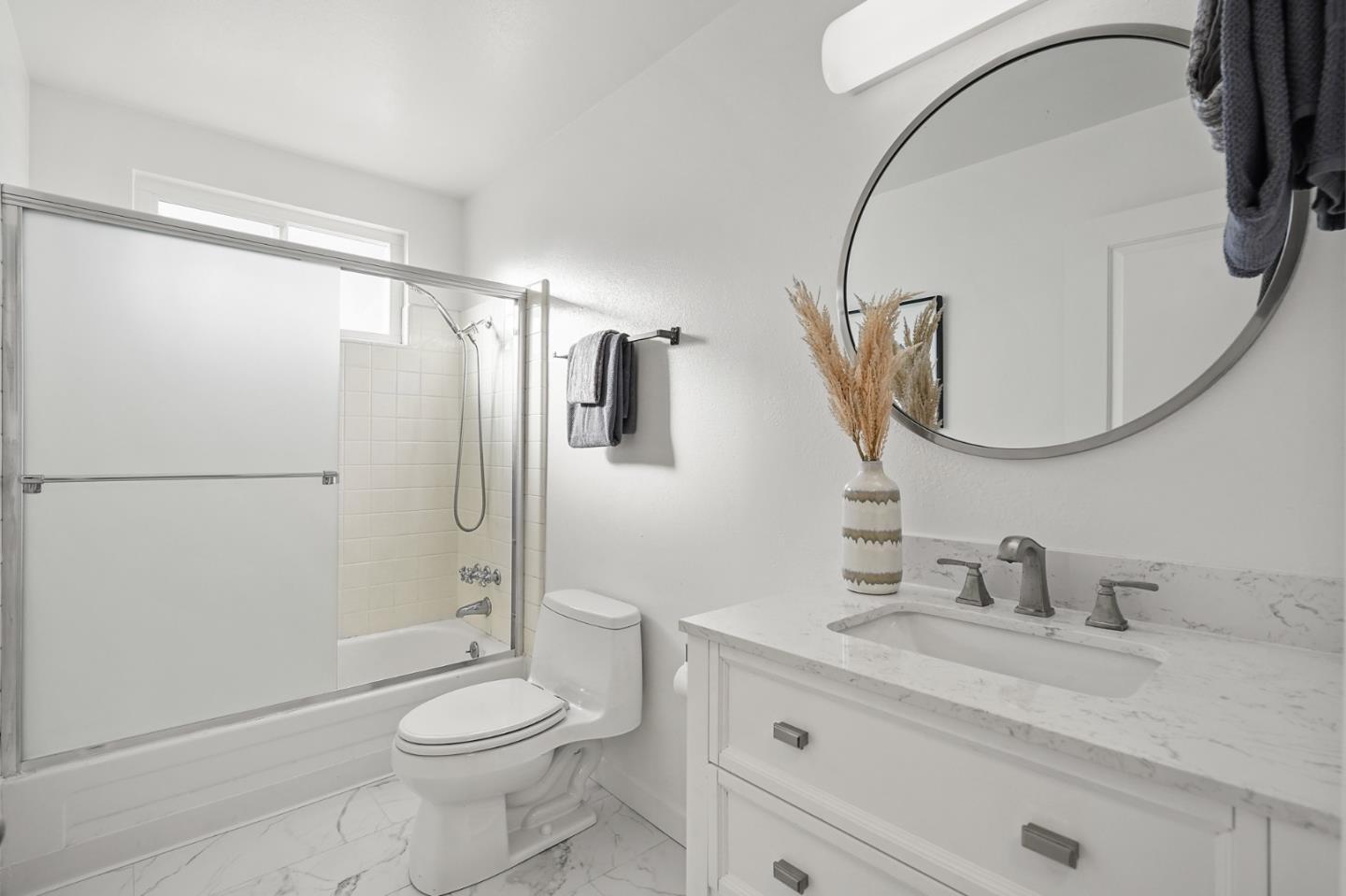 545 Sobrato Drive Campbell, CA 95008 - Photo 14 of 32 a bathroom with a granite countertop sink toilet and shower