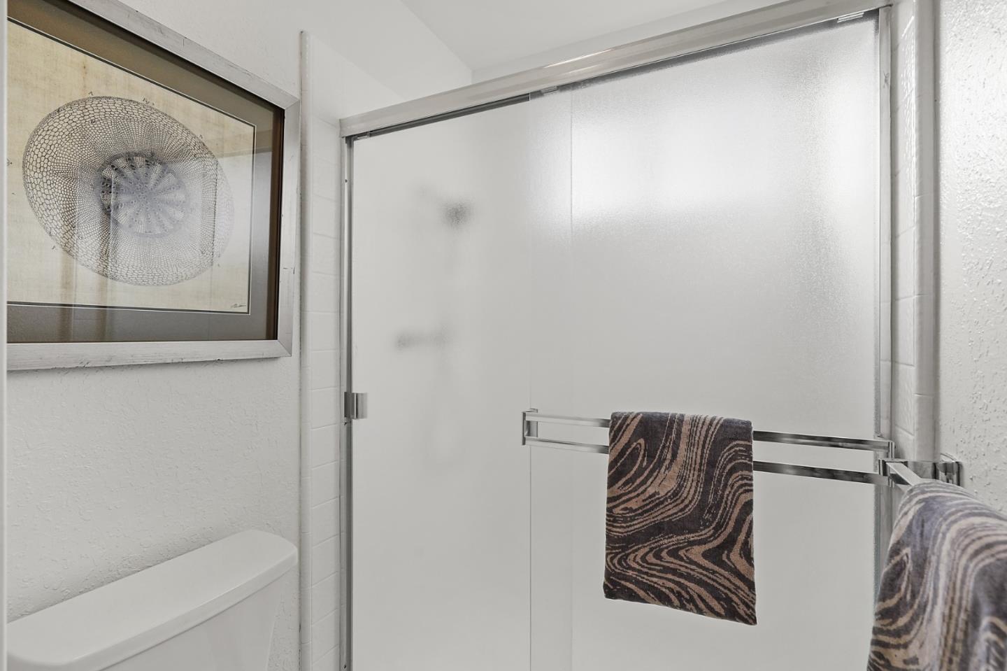 545 Sobrato Drive Campbell, CA 95008 - Photo 16 of 32 a bathroom with a bathtub and a shower