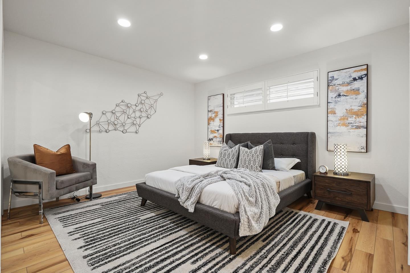 545 Sobrato Drive Campbell, CA 95008 - Photo 17 of 32 a bedroom with a bed and wooden floor