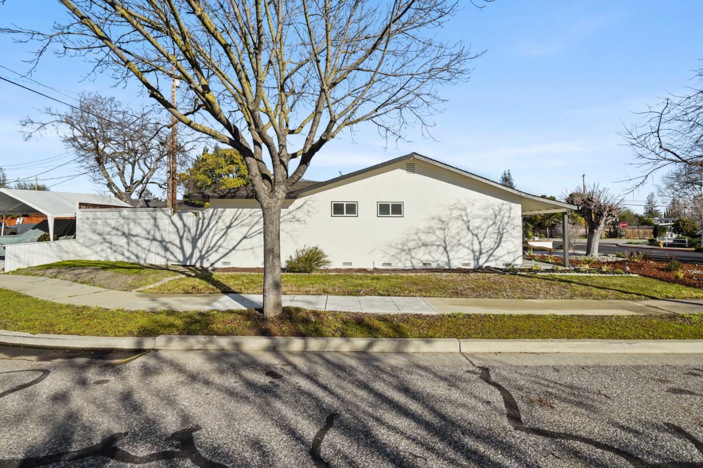 545 Sobrato Drive Campbell, CA 95008 - Photo 29 of 32 a view of a house with a yard covered with snow