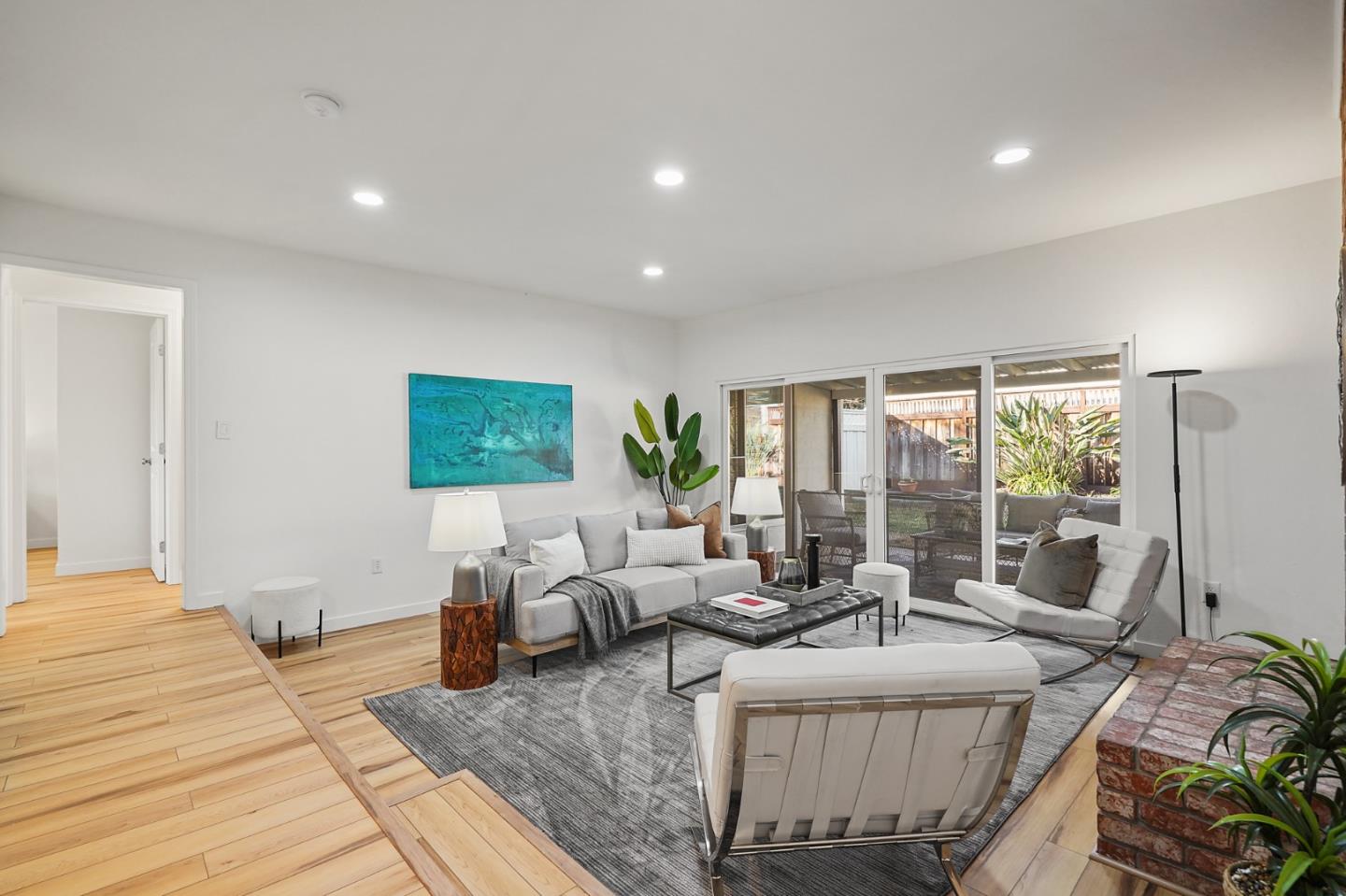 545 Sobrato Drive Campbell, CA 95008 - Photo 4 of 32 a living room with furniture and a floor to ceiling window
