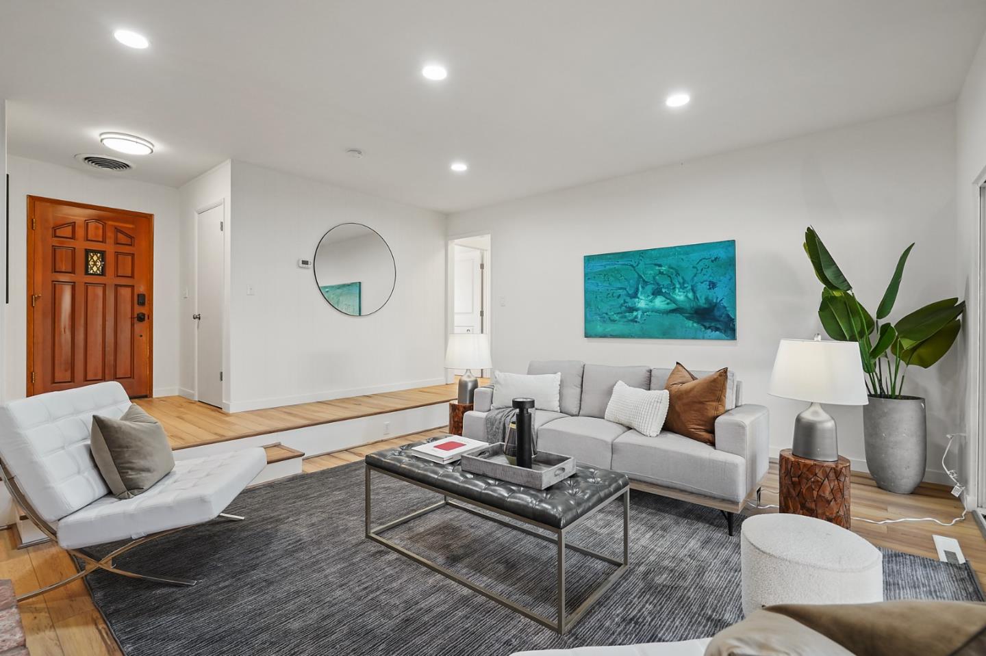 545 Sobrato Drive Campbell, CA 95008 - Photo 6 of 32 a living room with furniture potted plant and a large window