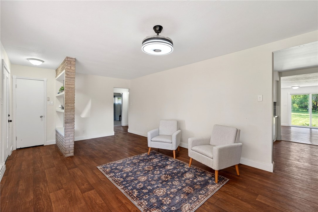 2684 Arthur Road Springfield, OH 45502 - Photo 14 of 69 This bright living space features rich wood flooring and a stylish ceiling fan, perfect for any gathering.