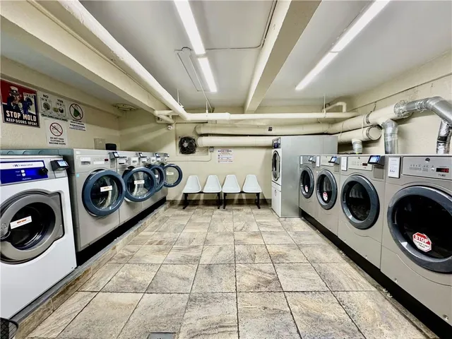a view of a studio with wooden floor