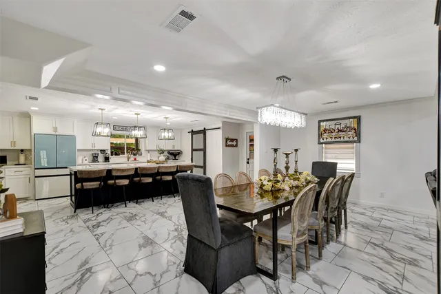 a view of a dining room with furniture
