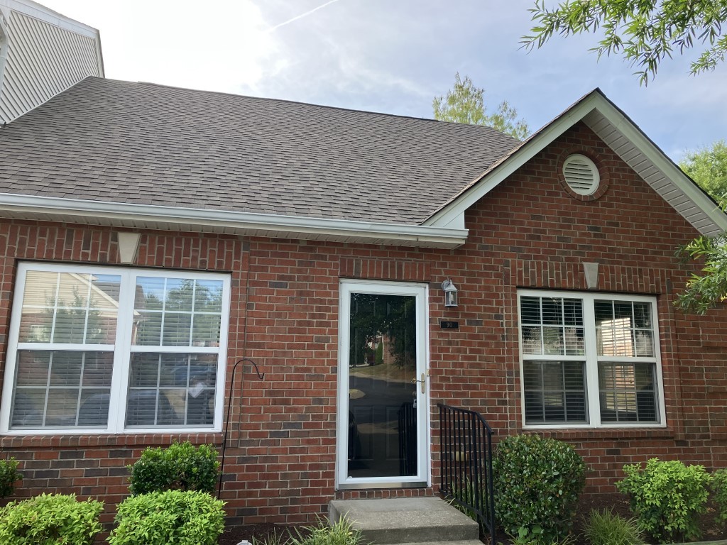 1101 Downs Boulevard, Unit 90 Franklin, TN 37064 - Photo 1 of 2 a front view of a house