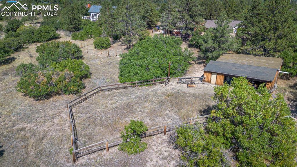 2915 Mt Herman Road Monument, CO 80132 - Photo 38 of 39 a aerial view of a house with yard and outdoor seating