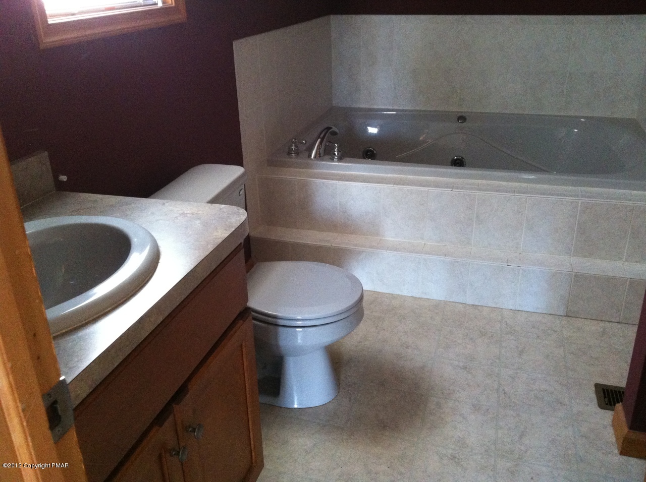 141 Rodeo Drive Hawley, PA 18428 - Photo 8 of 17 a bathroom with a toilet and a sink