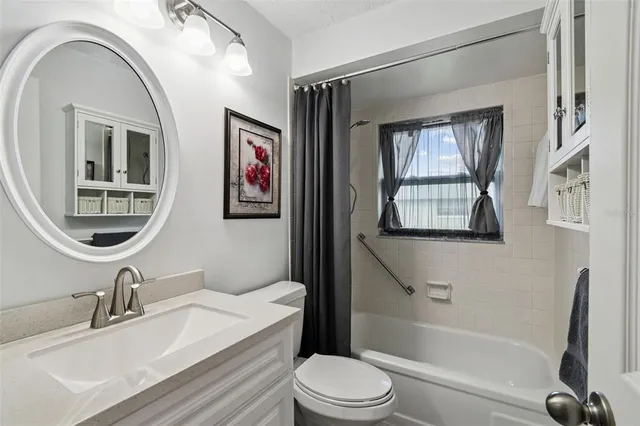 a bathroom with a toilet a sink and a bathtub