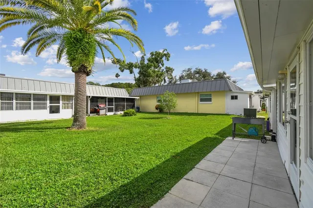 a house view with a garden space