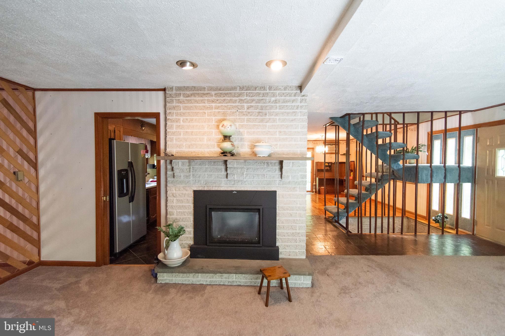 990 Quarry Road Gap, PA 17527 - Photo 18 of 62 White Brick with gas fireplace