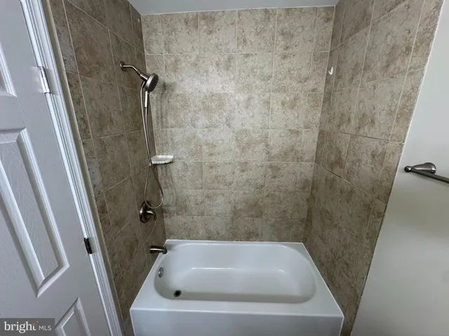 a bathroom with a tub