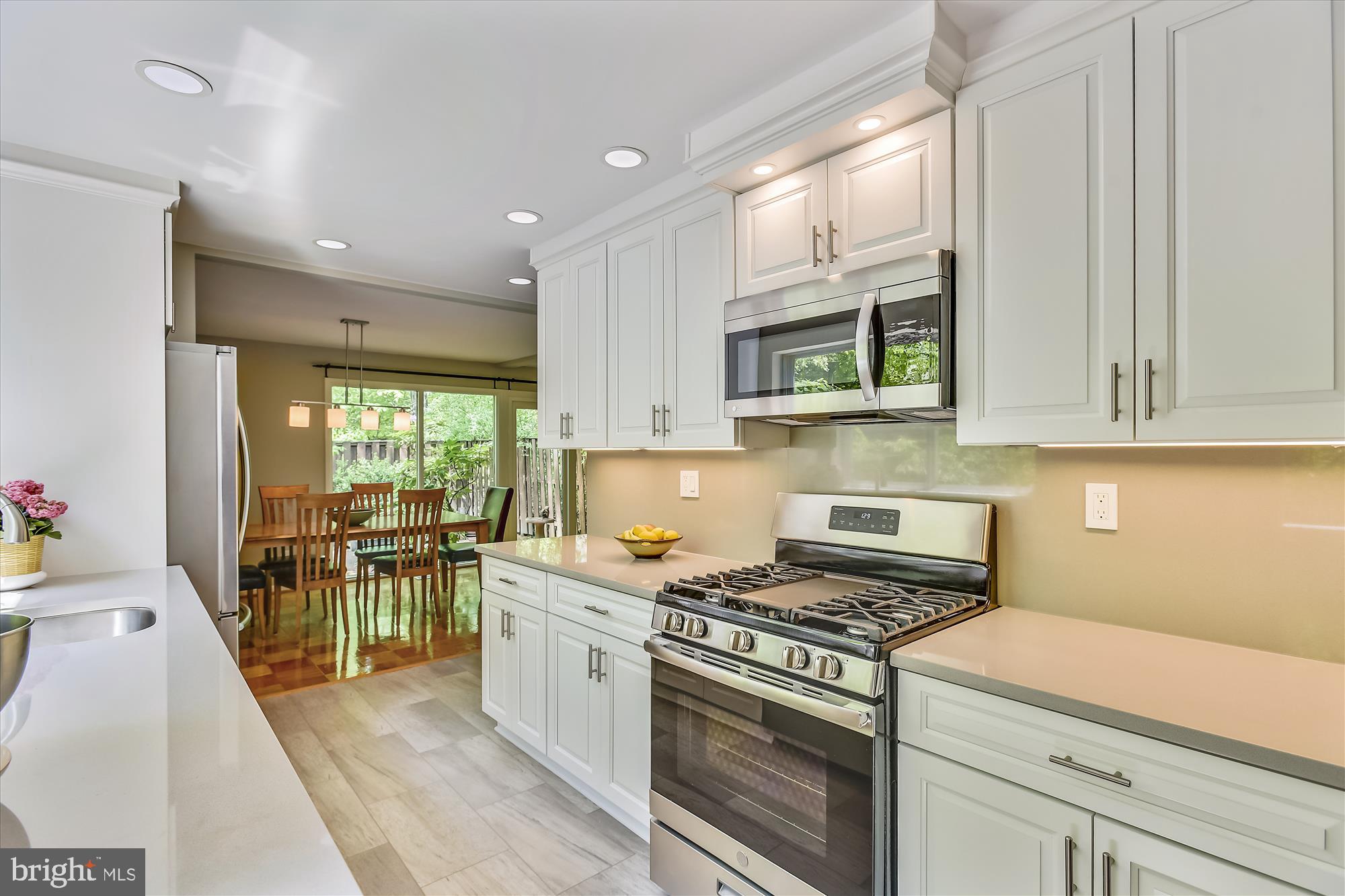 2410 Bugle Lane Reston, VA 20191 - Photo 5 of 65 Notice all the recessed and under cabinet lighting