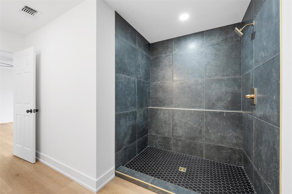 721 Taylor Street Waco, TX 76704 - Photo 15 of 28 a bathroom with a shower