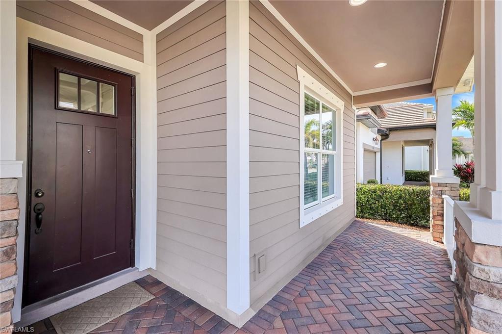 3529 Pilot Circle Naples, FL 34120 - Photo 12 of 47 a view of a porch with furniture