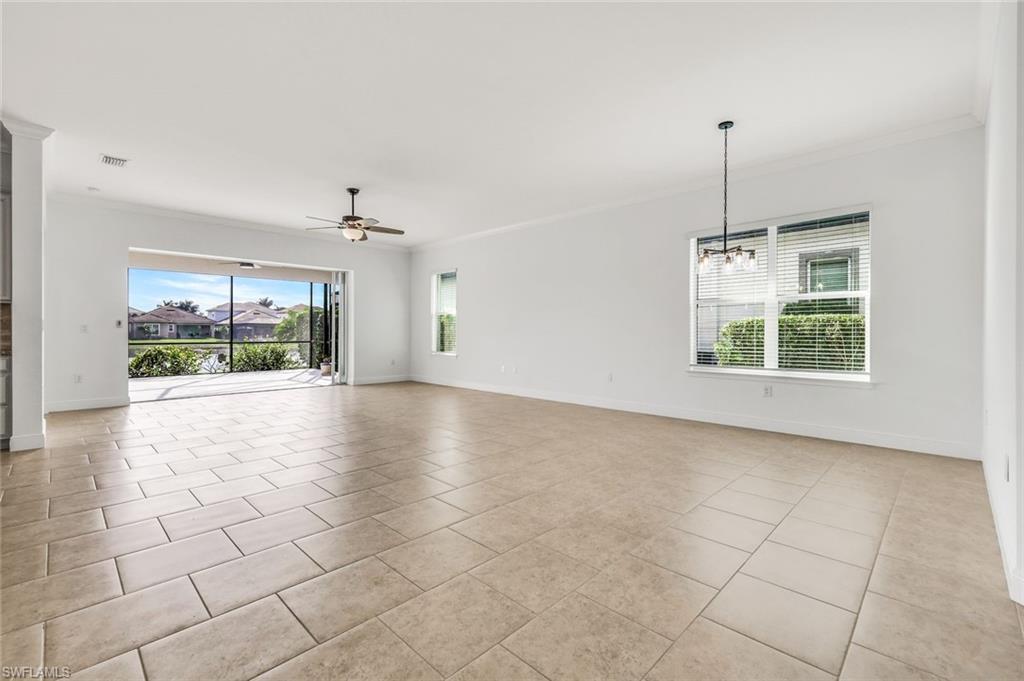 3529 Pilot Circle Naples, FL 34120 - Photo 16 of 47 a view of an empty room with a window