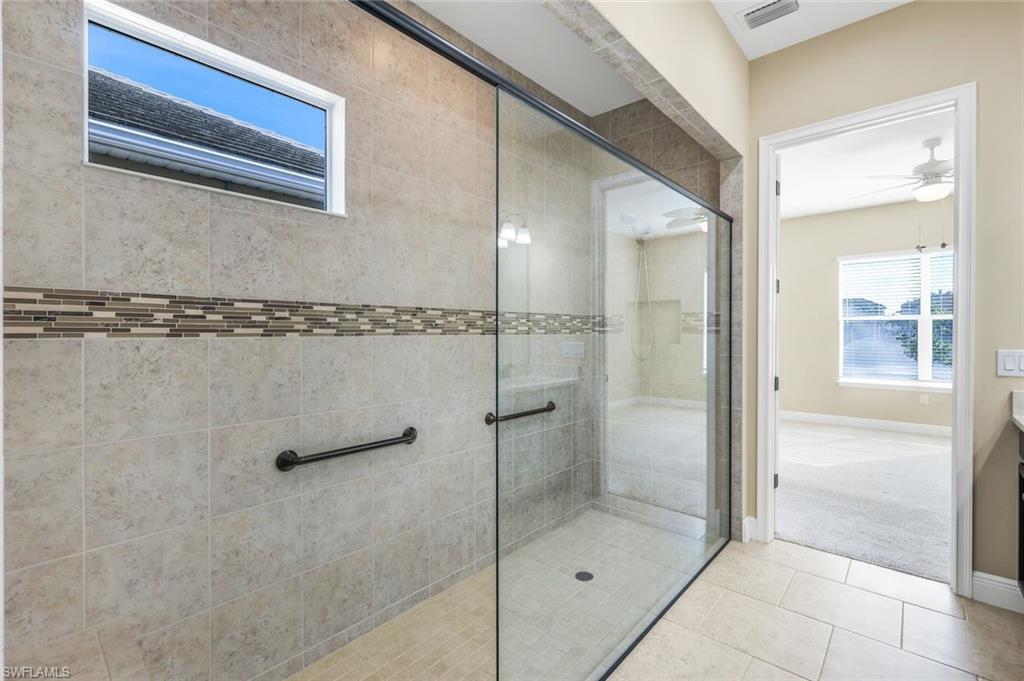 3529 Pilot Circle Naples, FL 34120 - Photo 25 of 47 a bathroom with a shower