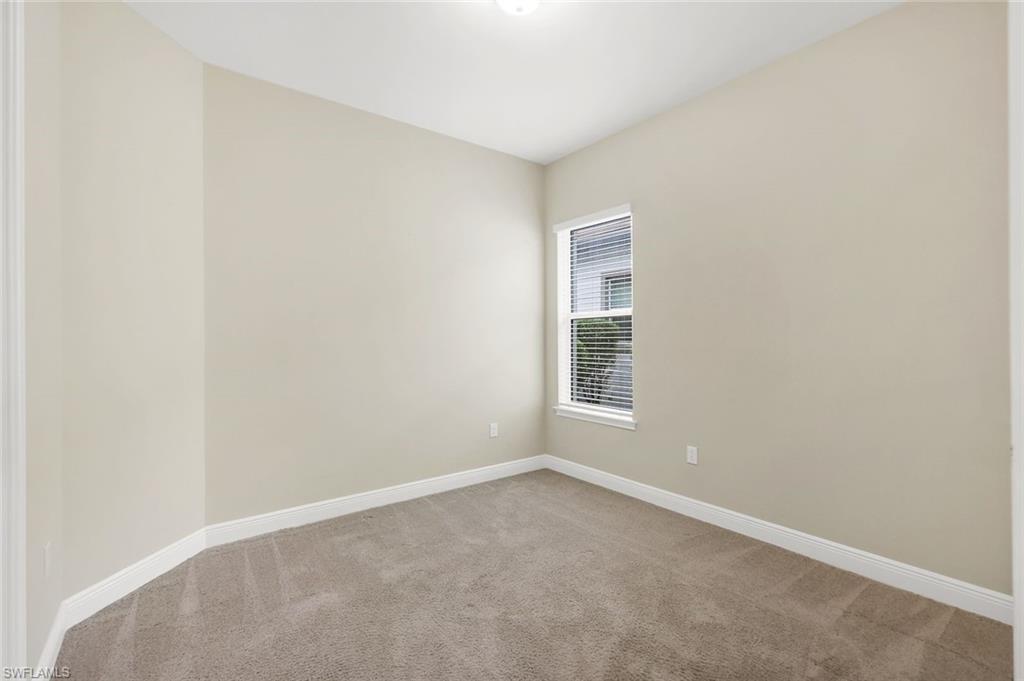 3529 Pilot Circle Naples, FL 34120 - Photo 26 of 47 an empty room with a window