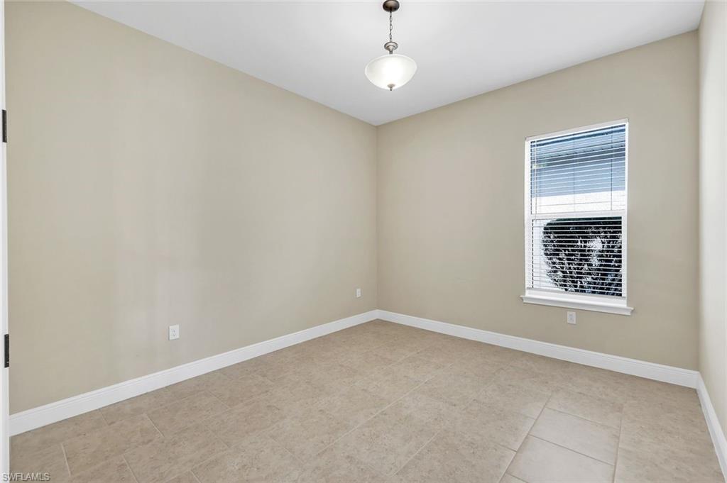 3529 Pilot Circle Naples, FL 34120 - Photo 28 of 47 an empty room with windows