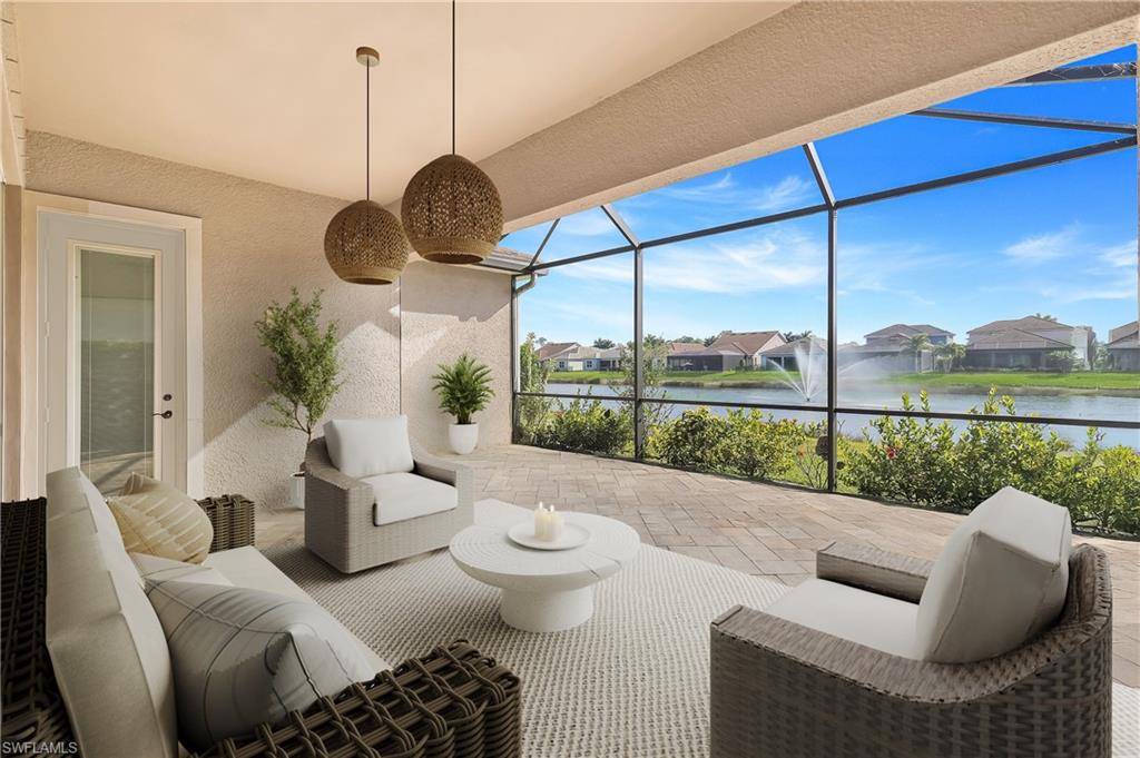 3529 Pilot Circle Naples, FL 34120 - Photo 3 of 47 a living room with furniture and a large window