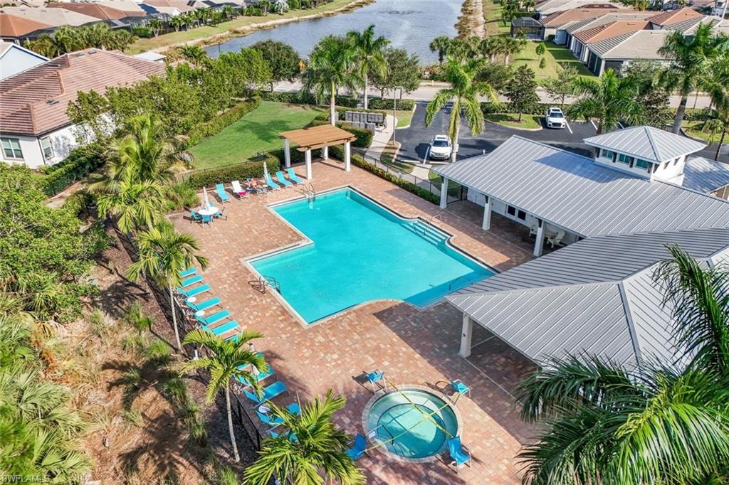 3529 Pilot Circle Naples, FL 34120 - Photo 39 of 47 an aerial view of a tennis ground and a yard