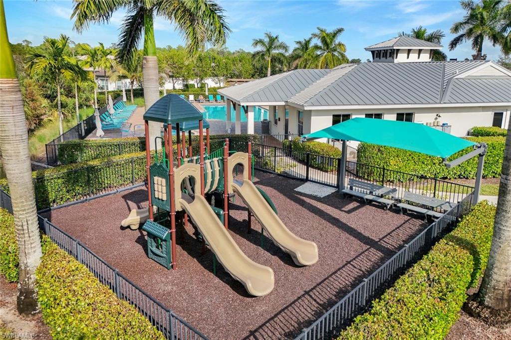 3529 Pilot Circle Naples, FL 34120 - Photo 42 of 47 swimming pool view with a seating space